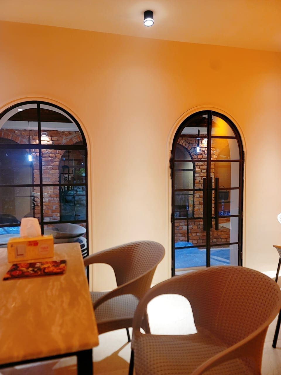 Arched windows and seating at Chokka Banani