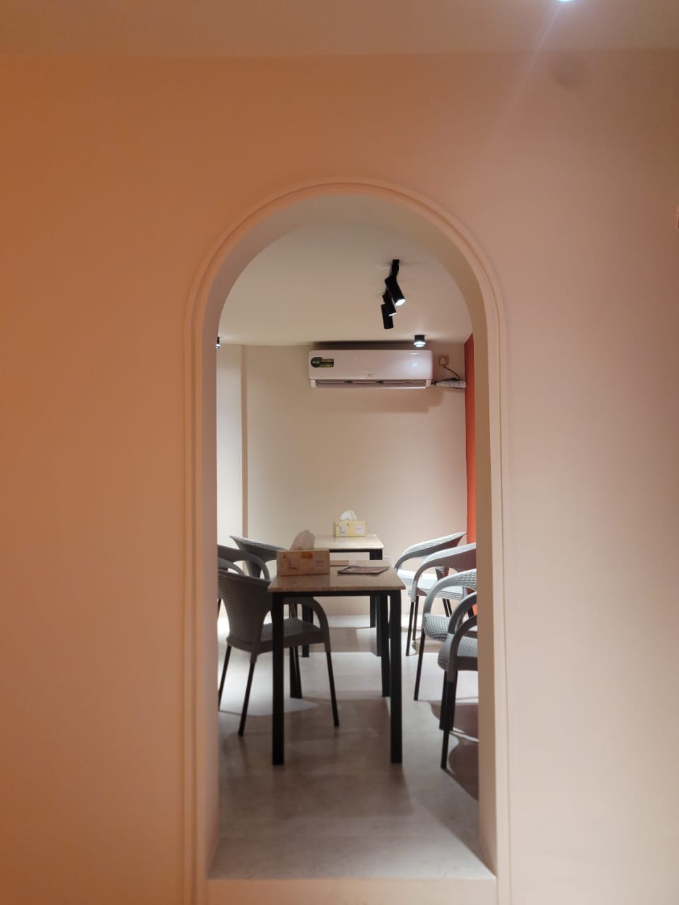 Archway leading into the dining room