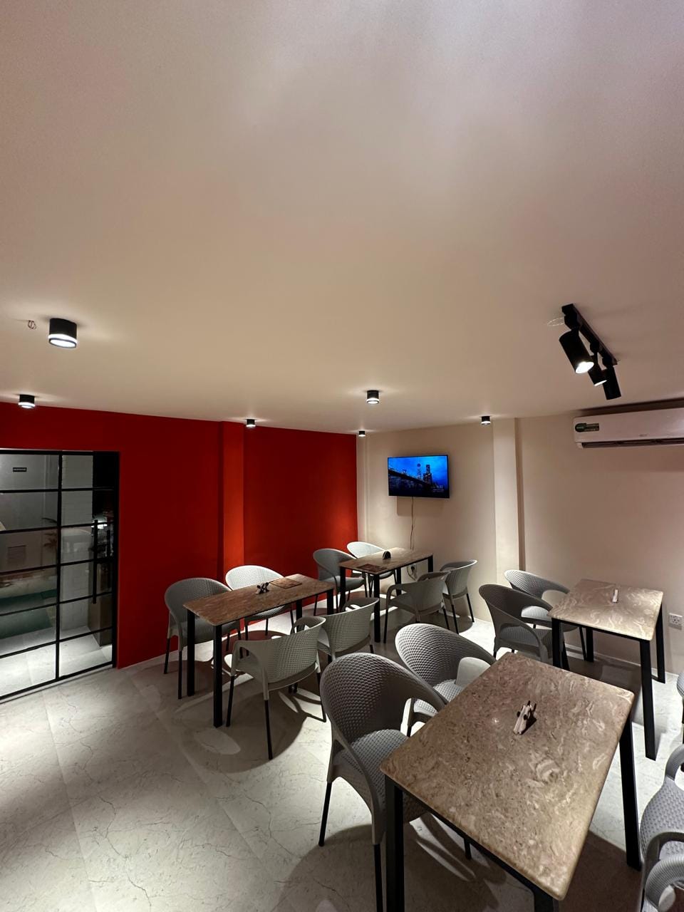 Main dining area with marble tables